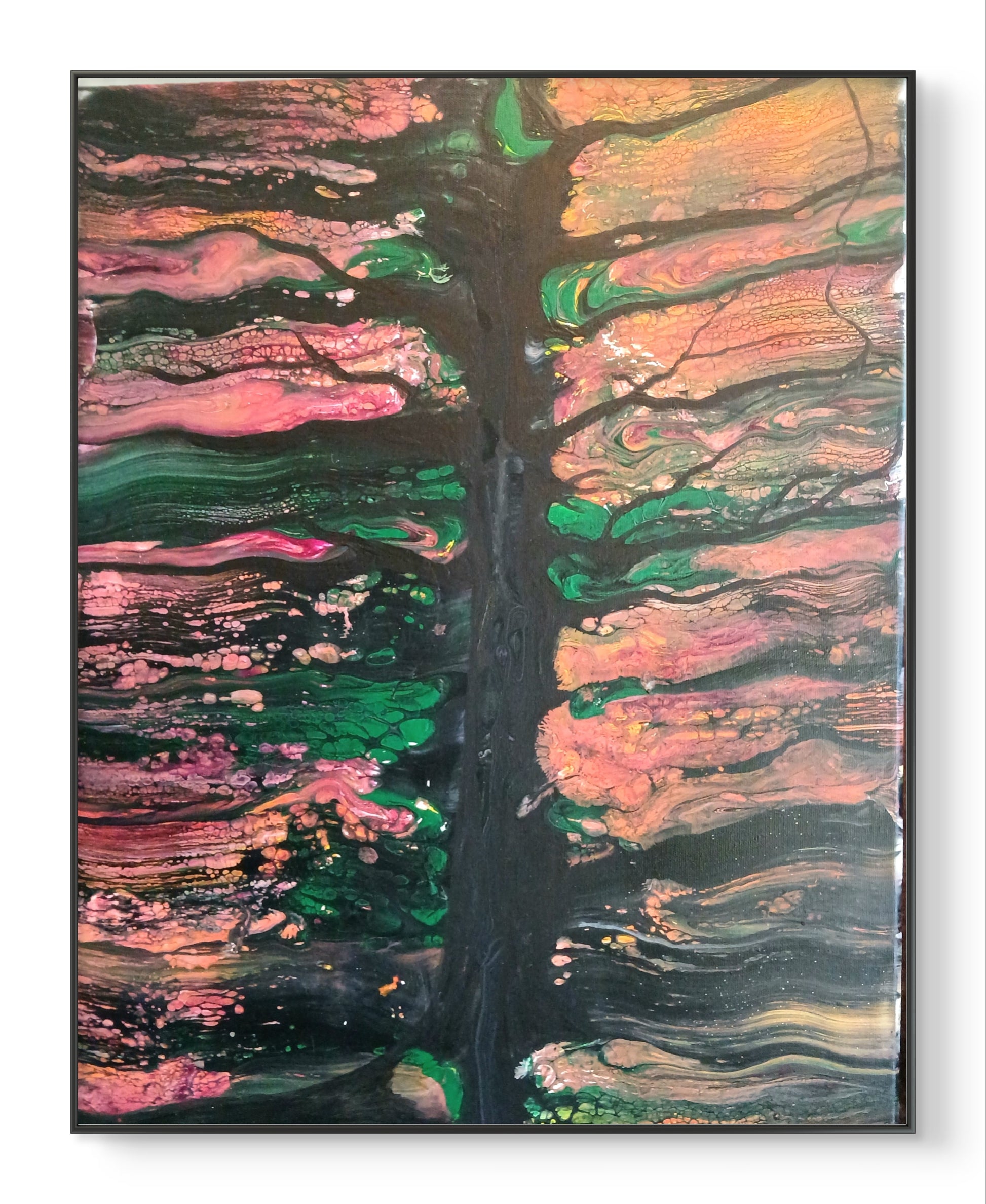 An abstract canvas painting of a tree, featuring a dark central trunk and branches with swirling layers of pink, green, black, and orange paint in the background, presented in a thin black frame.